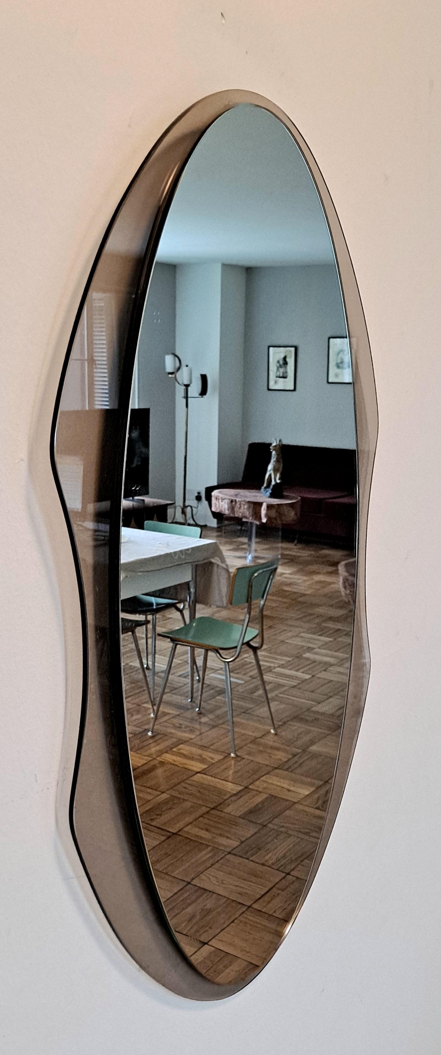 Italian mid century wall mirror by Cristal Arte .Miror is original condition and  the shape is special artistic work.