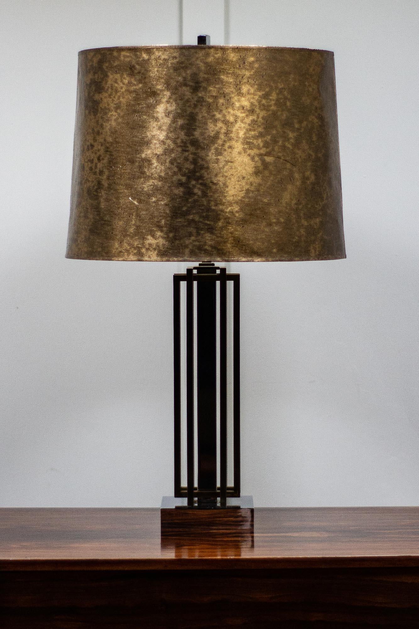 Mid-Century Modern lamp designed by Willy Rizzo for Lumica. 

This 1970s lamp works very well with the geometric design in contrast to the chrome and brass on the lamp. 

This lamp has a twin bulb holder with an original shade and a wise and
