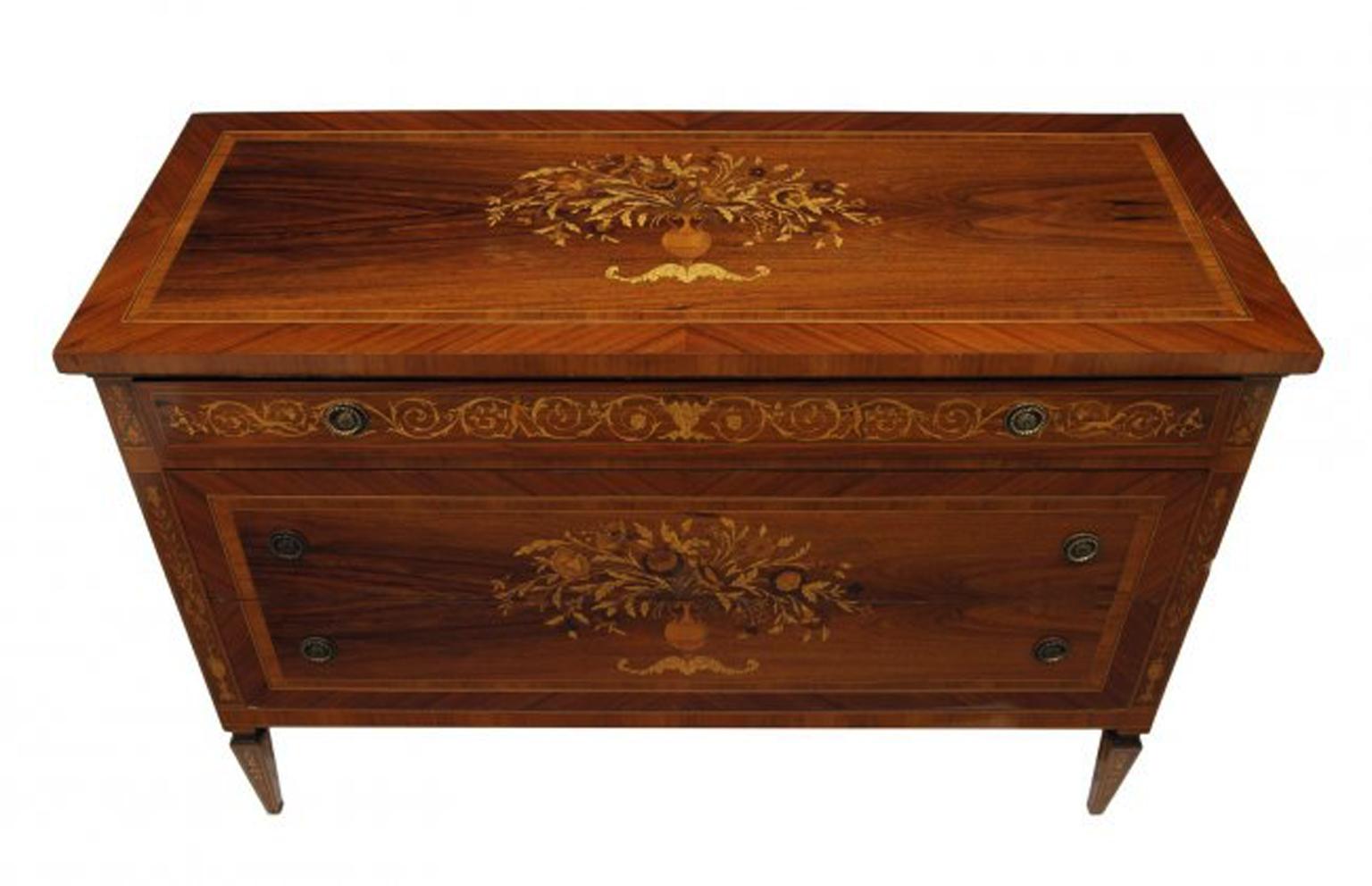 Beautiful Italian Milanese Maggiolini style finely inlaid veneered and long commode with three long drawers, terminating in square tapered legs.
Meticulous attention was given to details of the inlay.
Mid-20th century.