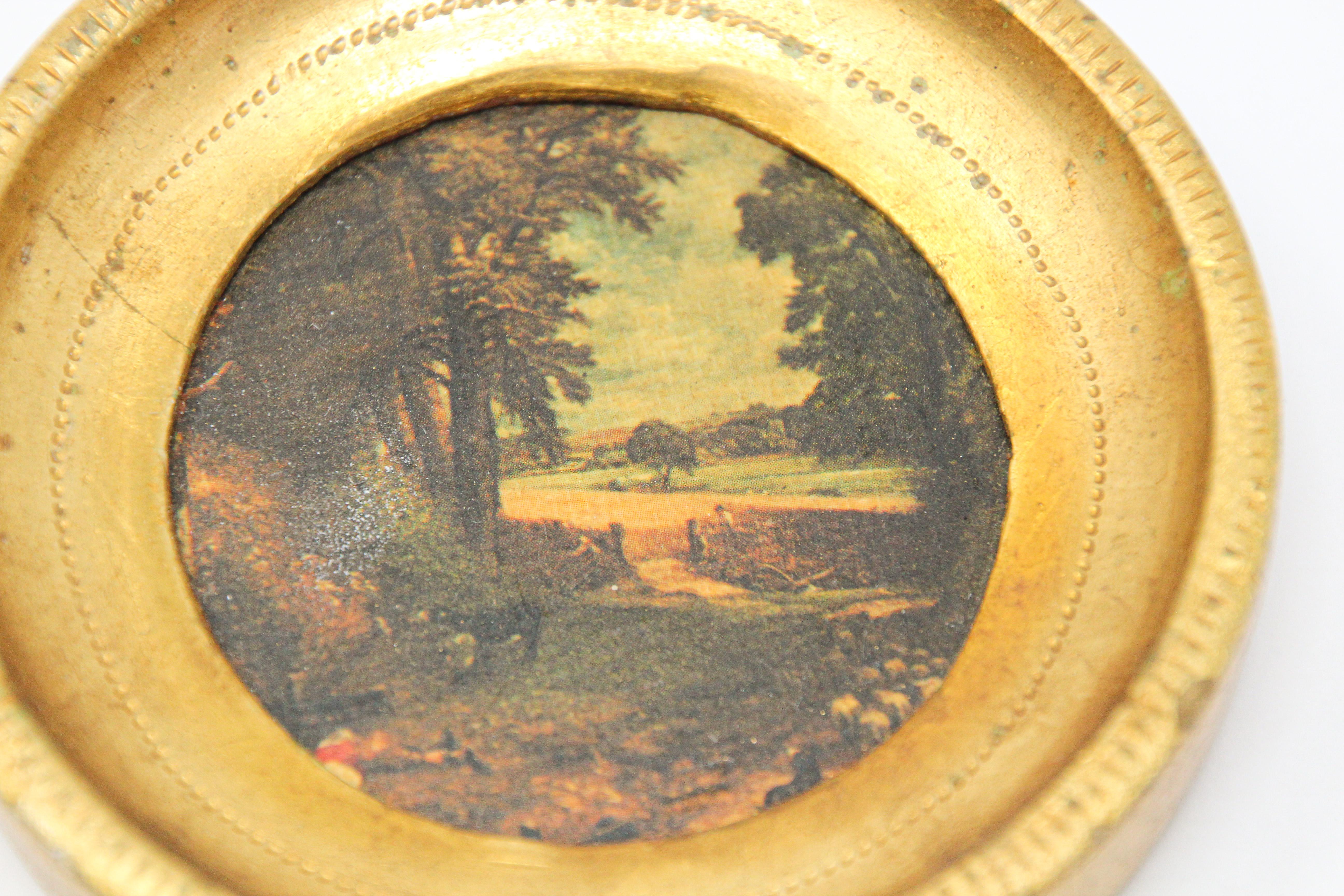 Italian miniature painting print framed in a circular gilt frame.
Giclee painting framed, stamped made in Italy in the back,
circa 1950.