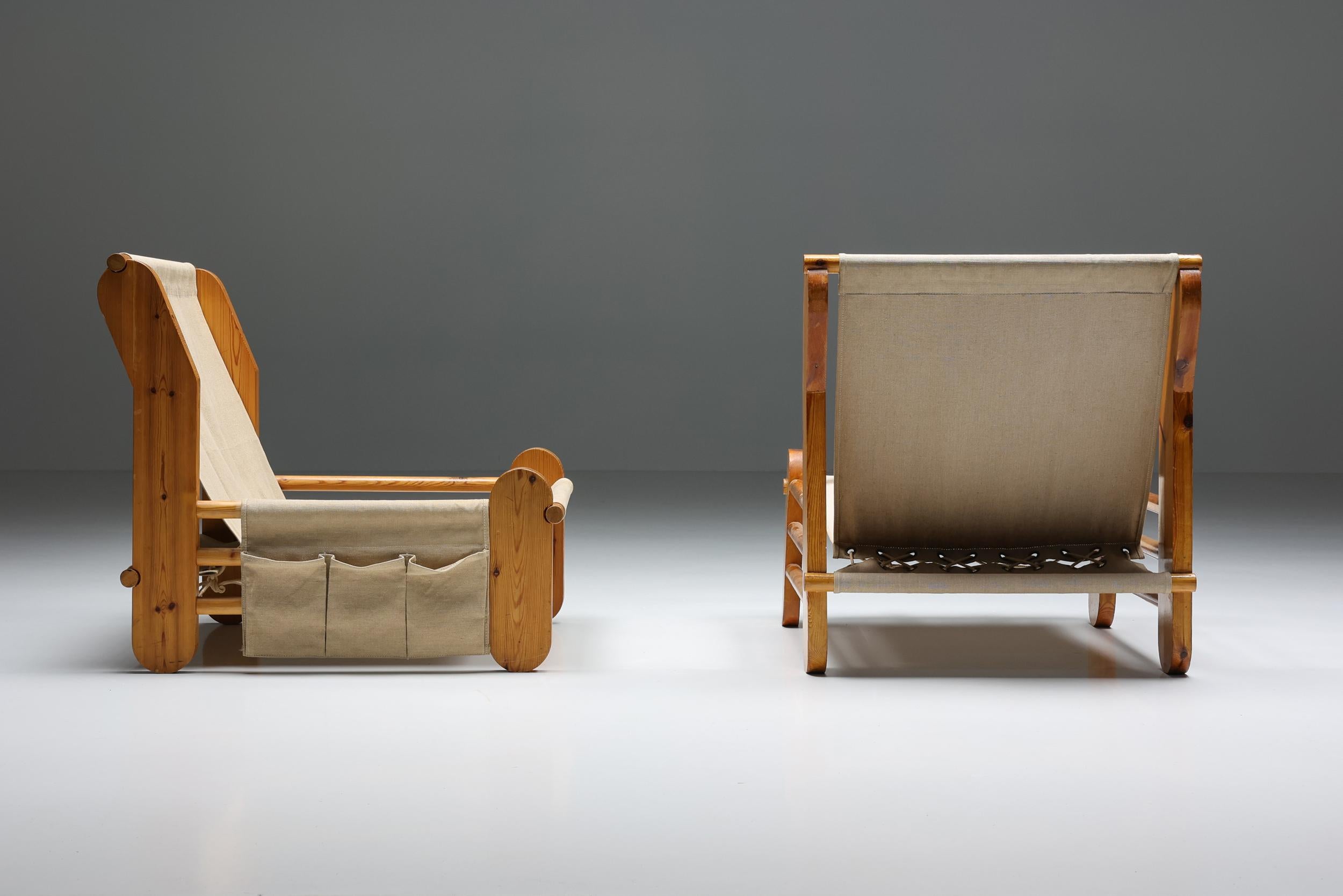 Italian Minimalism; Architectural; Easy chair; Lounge chair; Pine; Canvas; Italian design; craftsmanship; 

Minimalist set of Italian lounge chairs with pine structure and canvas seating. Canvas storage elements on the left-hand side, offering