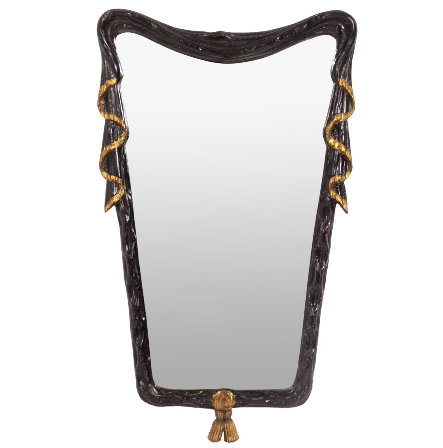 Italian mirror and wall-mounted console, Italy, circa 1950s. Retains it's original antiqued finish. The mirror measures 36
