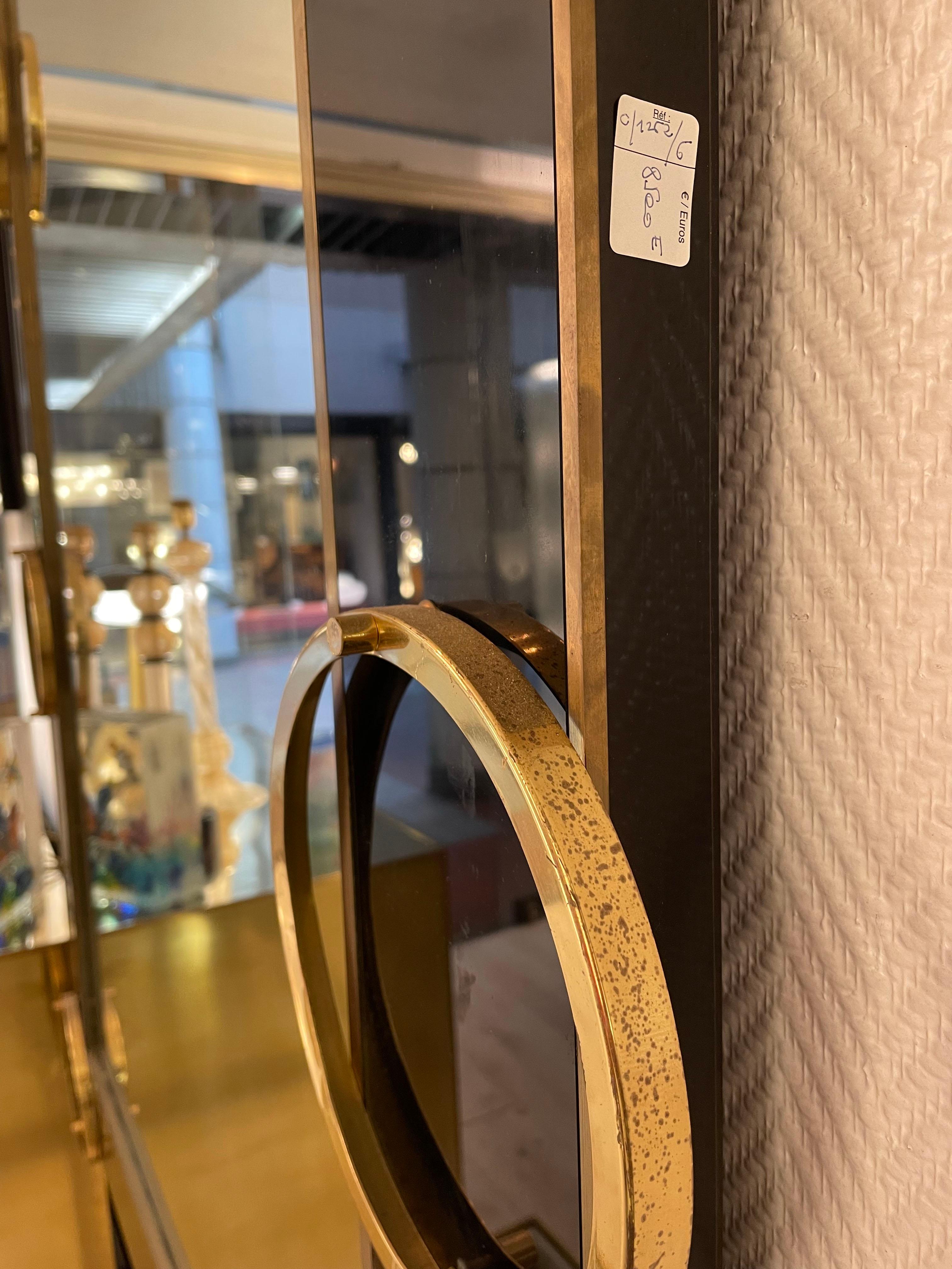 Glass Italian mirror from the 70's in tinted glass and brass  For Sale