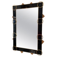 Italian mirror from the 70's in tinted glass and brass