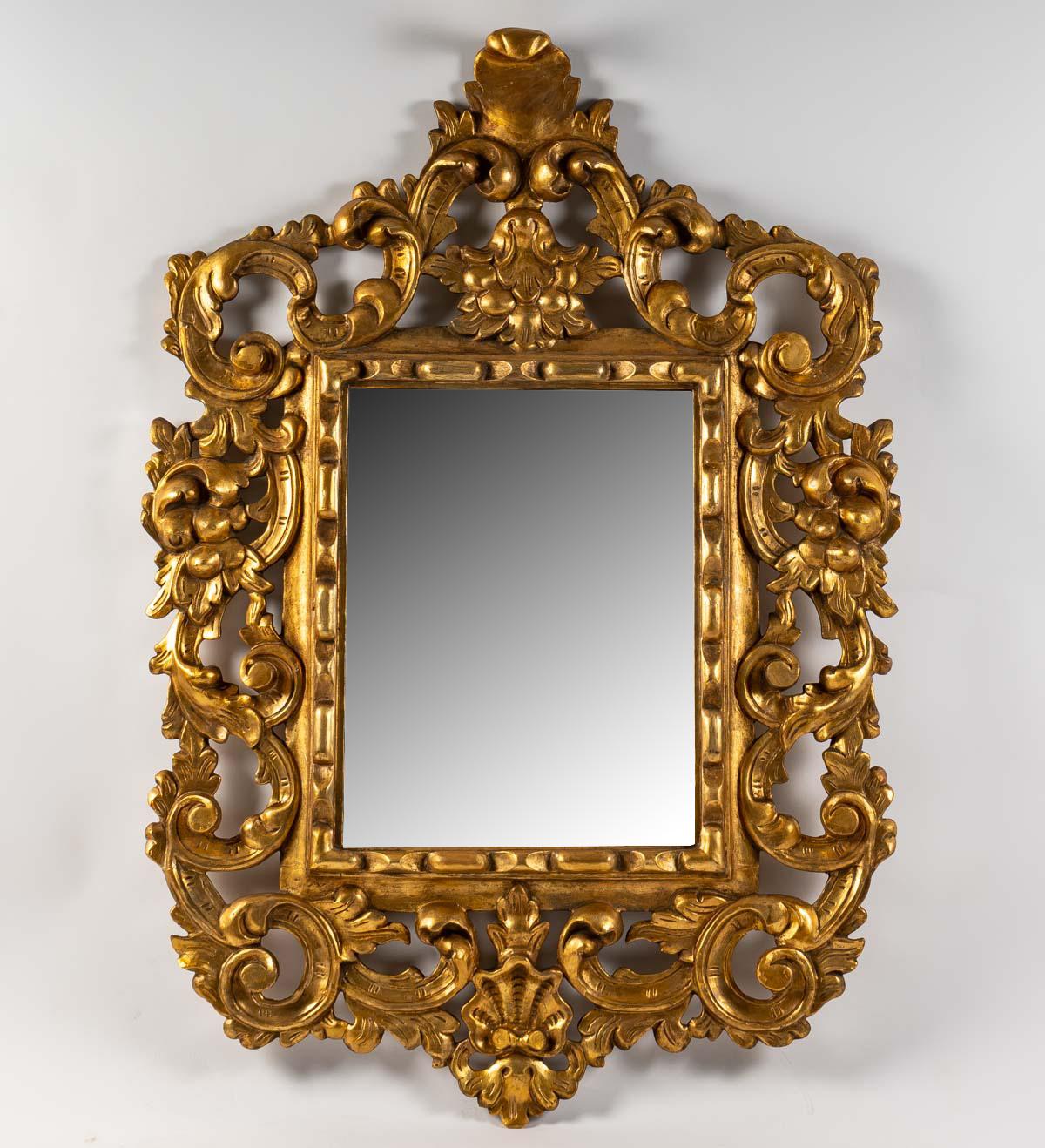 Italian mirror in gilded carved wood, bevelled glass, Napoleon III period.

Measures: H: 110 cm, W: 79 cm, D: 7 cm

 