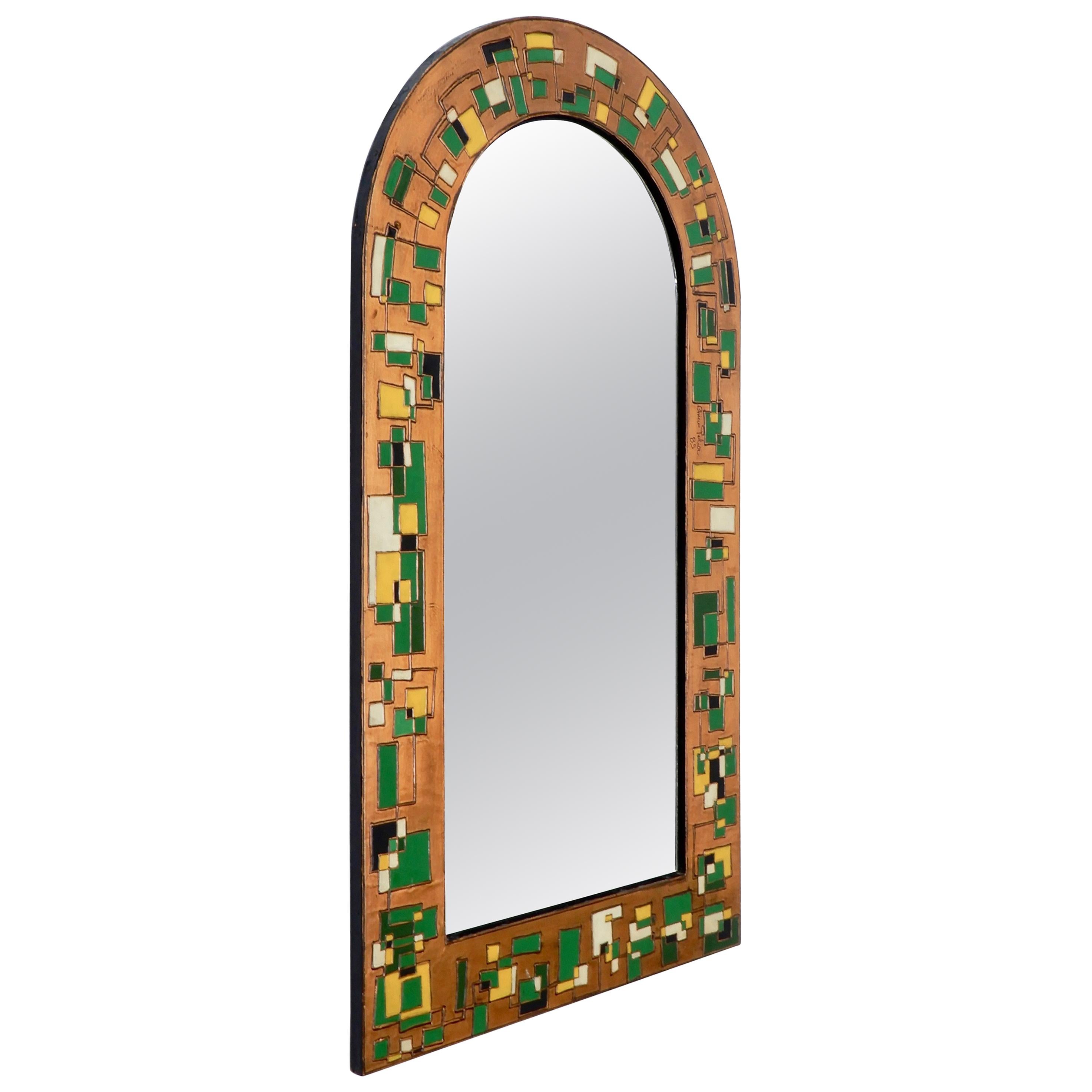 Miroir italien avec cadre à feuilles en cuivre repoussé coloré