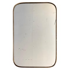 Miroir italien avec cadre en laiton des années 1950