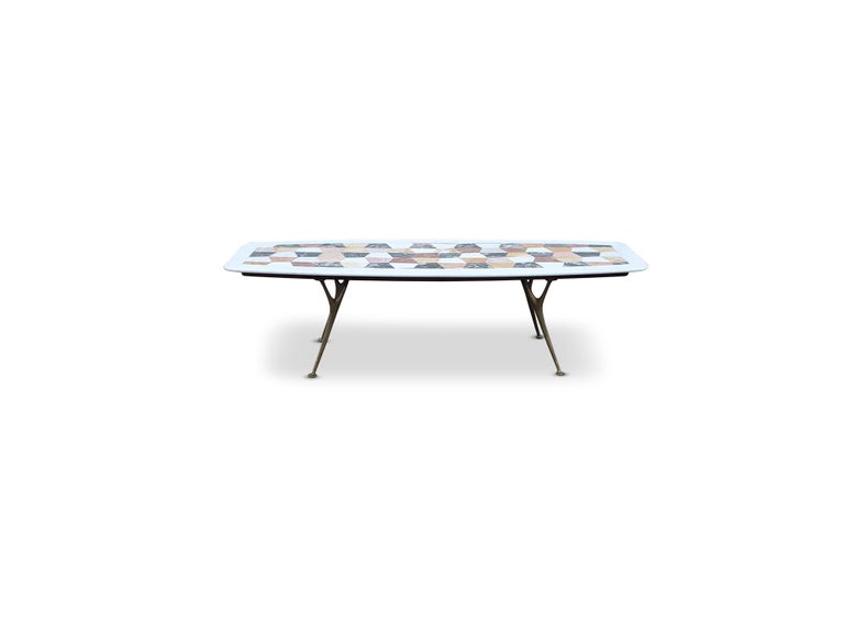 Italian mixed marble top coffee table with sculpted brass legs.