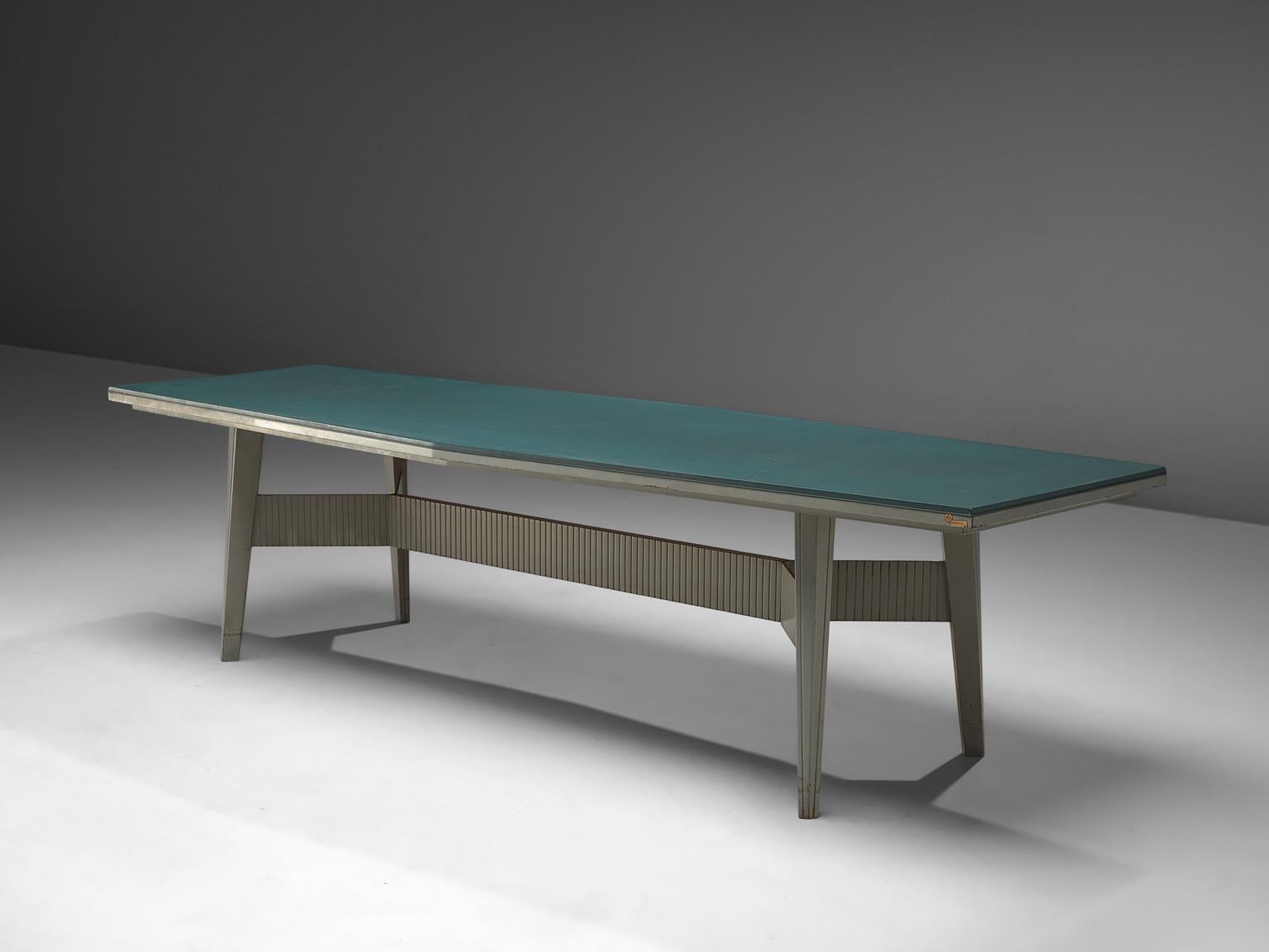 Mobiltecnica, work table, metal and leatherette, Italy, 1970s

This three meter long conference table is made in Turin, Italy in the 1970s. The table features a metal table, with a turquoise leatherette tabletop which is boat shaped. The base