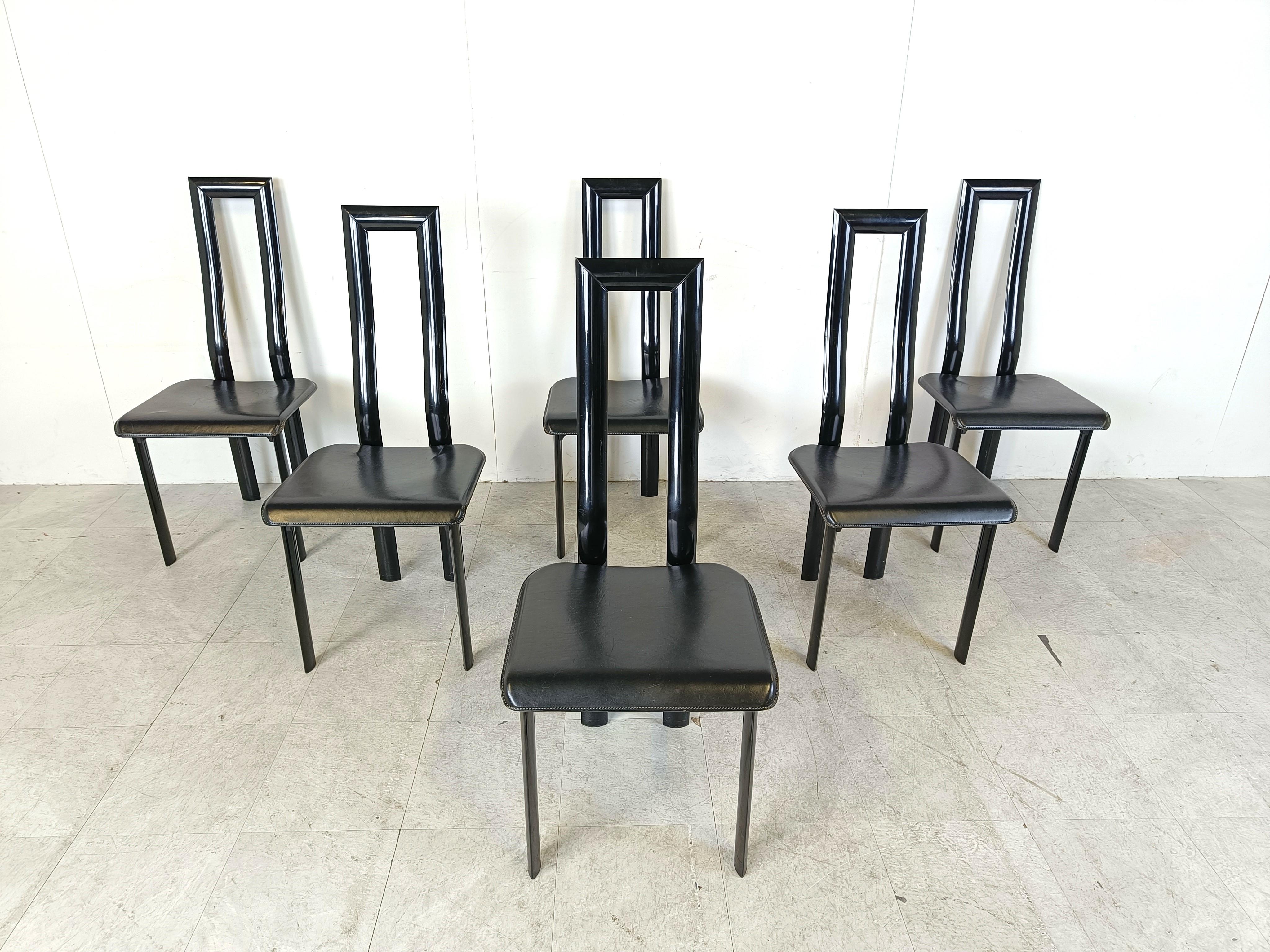 Italian Model Regia Dining Chairs by Antonello Mosca for Ycami.

Both frame and seats are completely in leather. 

Timeless post modern design.

Very good overall condition

1980s - Italy

Dimensions:
Height: 102cm/40.15