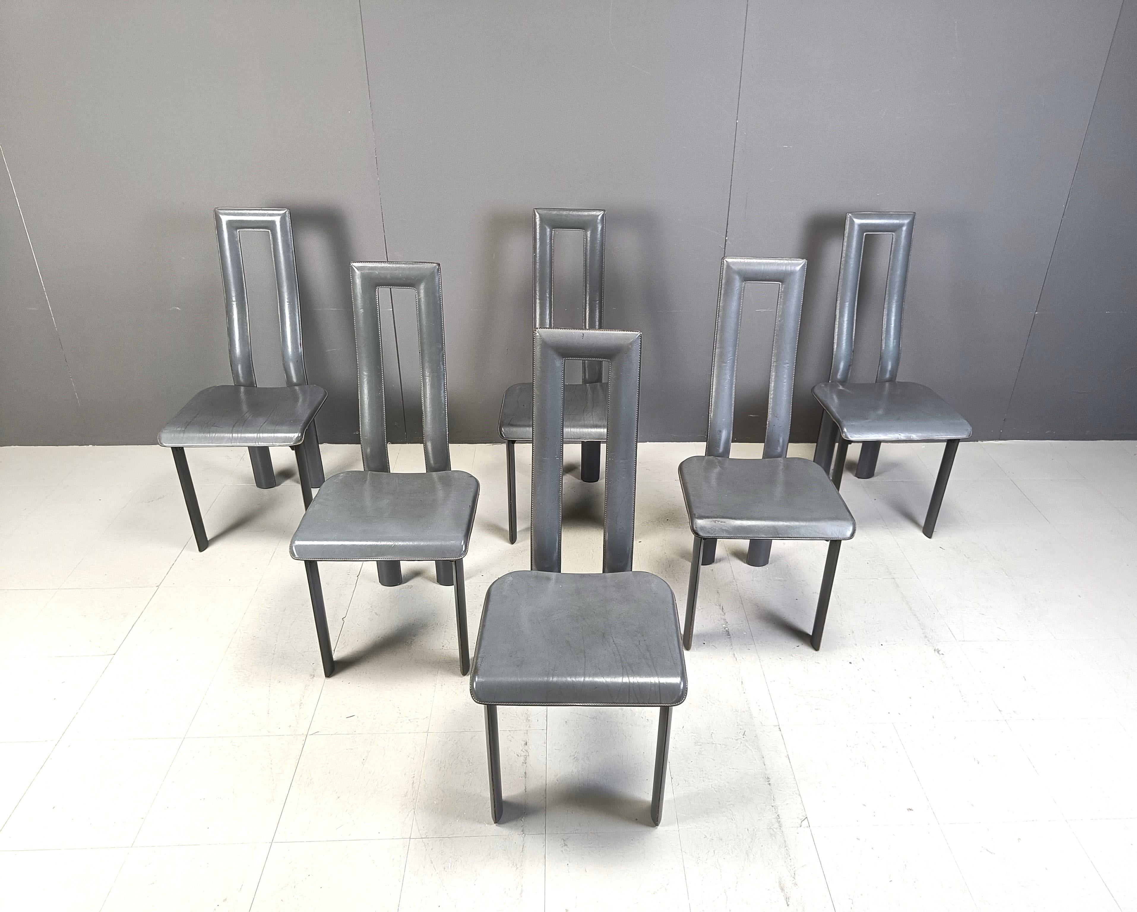 Italian Model Regia Dining Chairs by Antonello Mosca for Ycami.

Grey aluminum frames with grey leather seats.

Timeless post modern design.

Condition, normal age related wear with some wear to the seats as pictured.

1980s -