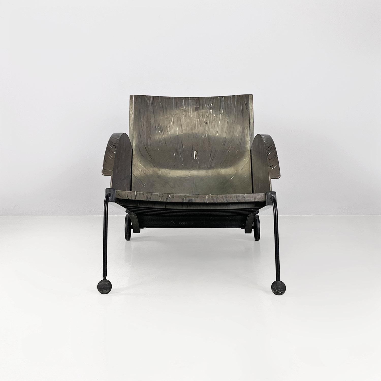Italian modern 4841 black recycled plastic armchair by Anna Castelli Ferreri for Kartell, 1980s.
Lounge chair or armchair model 4841, with structure entirely made of plastic, in particular a mix of recycled polyethylene materials, with ball feet on