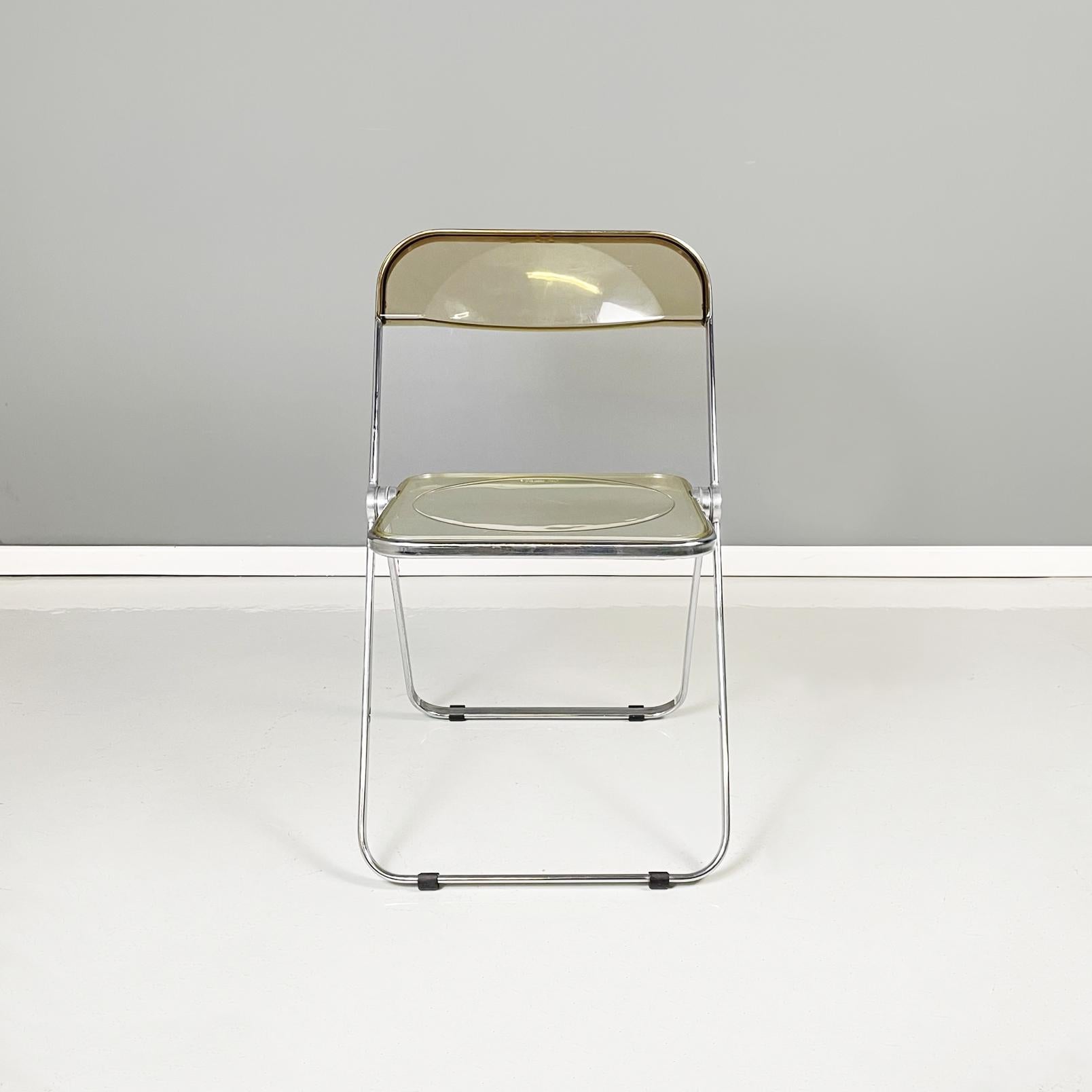 Italian modern Folding chair mod. Plia by Giancarlo Piretti for Anonima Castelli, 1970s
Iconic and fantastic folding chair mod. Plia with square seat in transparent abs and back in black-brown smoked abs. The structure is in steel.
It is produced by