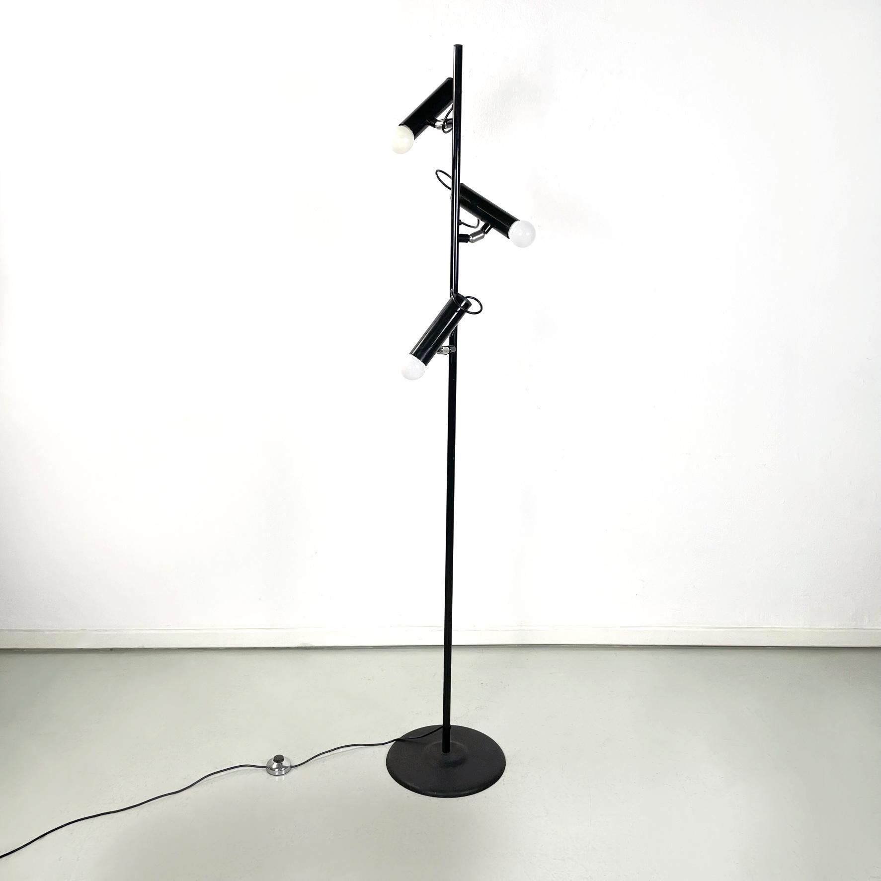 Italian modern Adjustable 3 lights floor lamp P393 by Luci in black metal, 1970s
Floor lamp mod. P393 with 3 adjustable lights. The central structure is in black painted steel rod with the 3 cylindrical diffusers, also in black steel. Round base in
