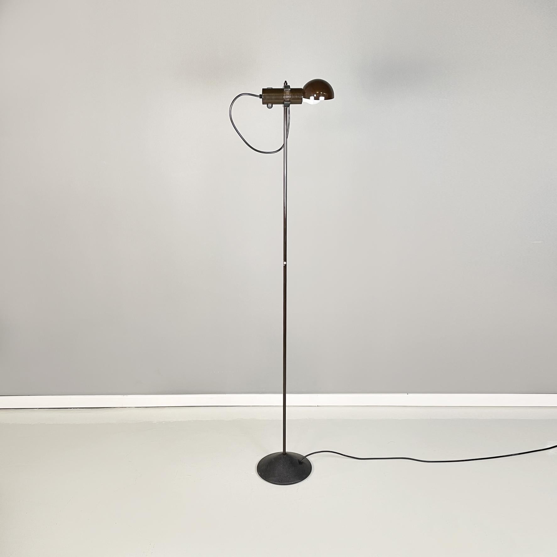 Italian modern Adjustable floor lamp in brown metal by Tronconi, 1970s
Floor lamp with adjustable height and inclination diffuser in brown painted metal. The diffuser is composed of a hemisphere and a cylinder, which connects to the central