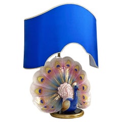 Vintage Italian modern adjustable table lamp with ceramic peacock and brass, 1970s