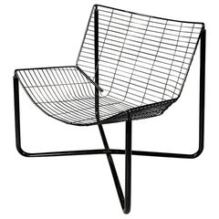 Sillón moderno italiano de metal tubular negro, años 80