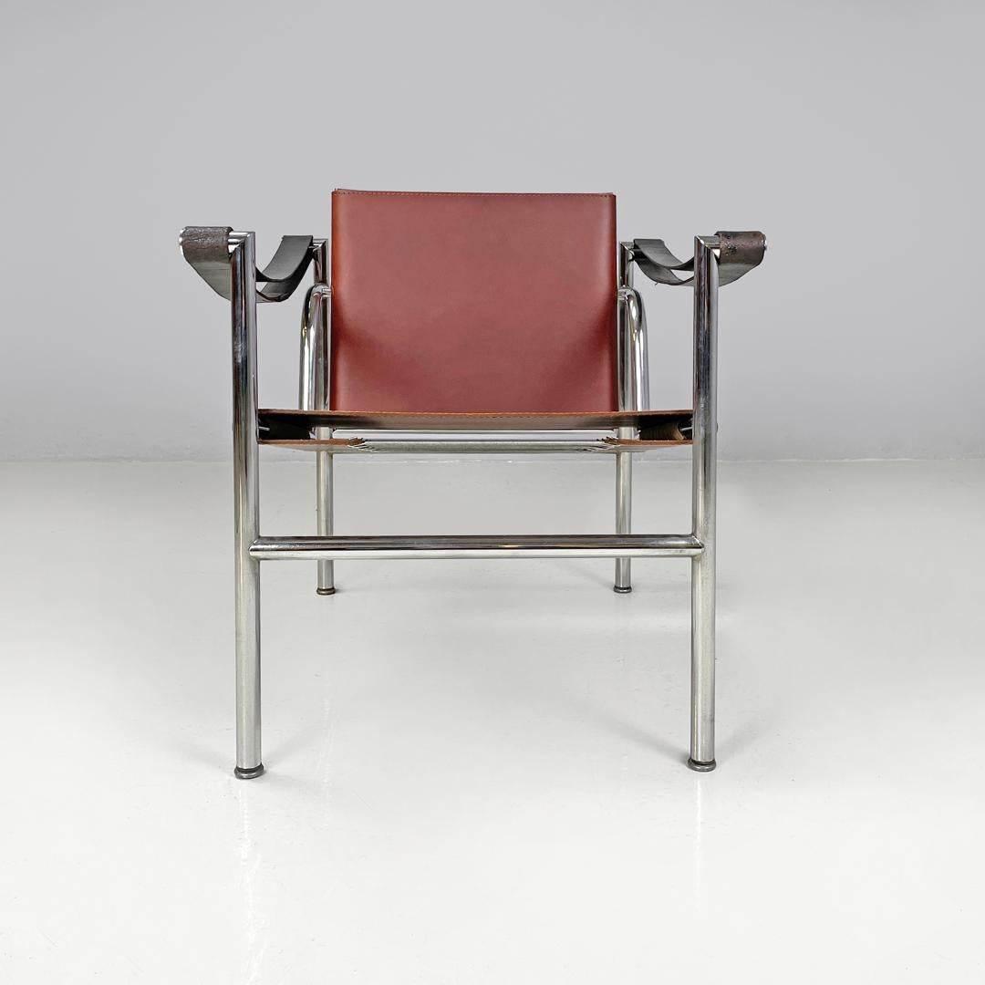 Moderner italienischer Sessel LC1 von Le Corbusier Jeanneret Perriand für Cassina, 1970er Jahre
Sessel Modell LC1 oder Fauteuil à dossier basculant mit einer basculant Rückenlehne. Sitz und Rückenlehne sind aus braunem, ziegelrotem Leder, während