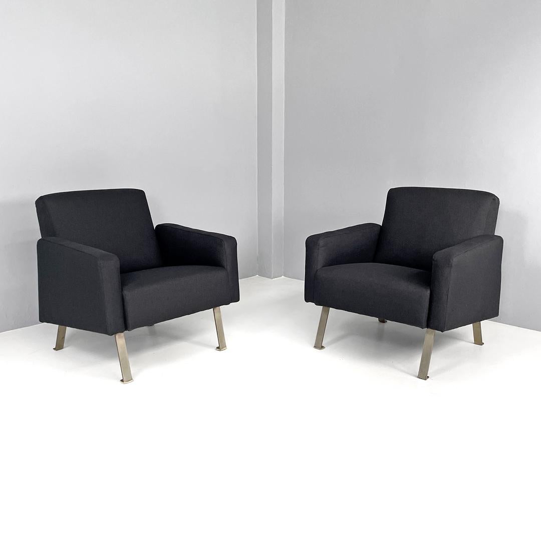 Italian modern armchairs in black fabric, 1970s
Pair of black fabric armchairs. The seat, backrest and armrests have linear, squared and essential shapes. The four legs are in chromed metal and have the ground support 