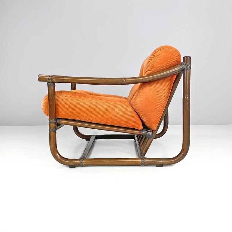 Sillón moderno italiano de bambú cojines naranja Tito Agnoli para Bonacina, años 70
Sillón con estructura de bambú. El asiento y el respaldo están ligeramente inclinados, con dos reposabrazos a los lados. Los elementos de la estructura están