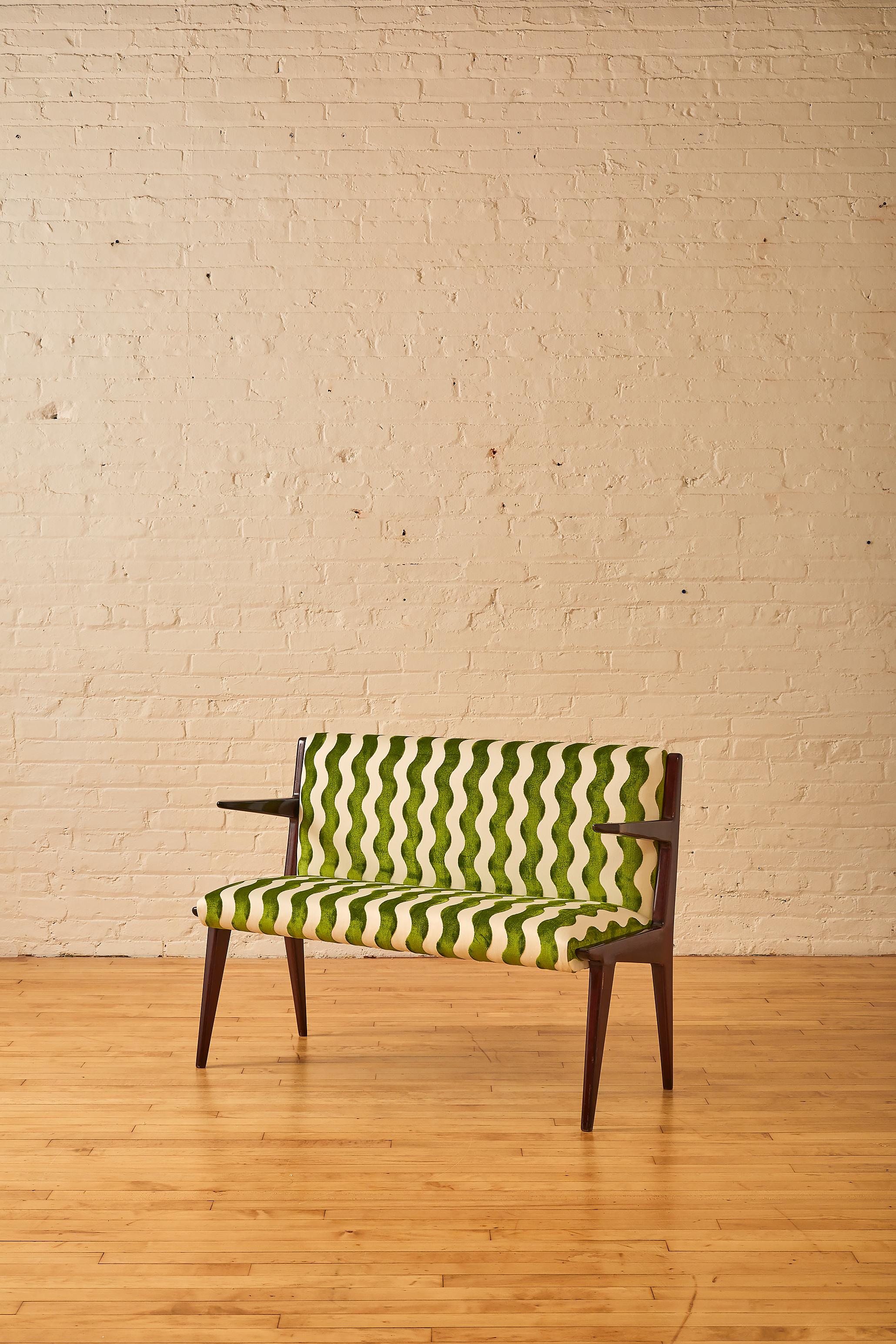 1960's Italian Modern bench by Fede Cheti. Reupholstered with Schumacher wavy fabric. 

