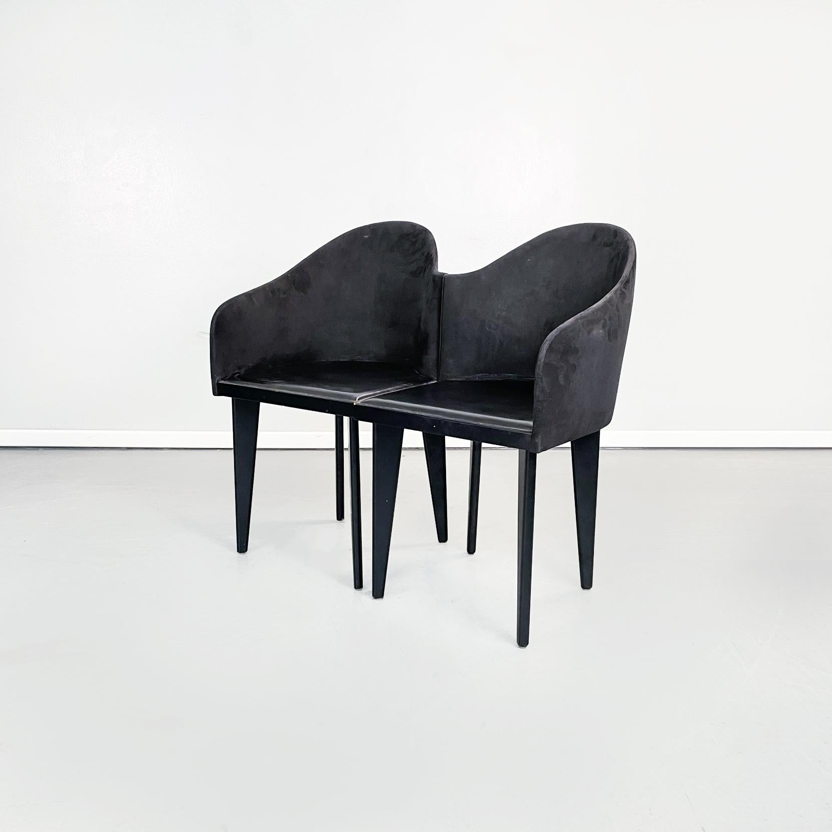 Italian modern Black chairs Toscana by Sartogo and Grenon for Saporiti, 1980s
Set of 4 chairs mod. Toscana with square seat in black synthetic leather. The back, which extends on two sides, has a sinuous curvature, with a wooden structure and
