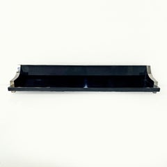 Italian modern black lacquered wood and chromed metal shelf by D.I.D., 1980s