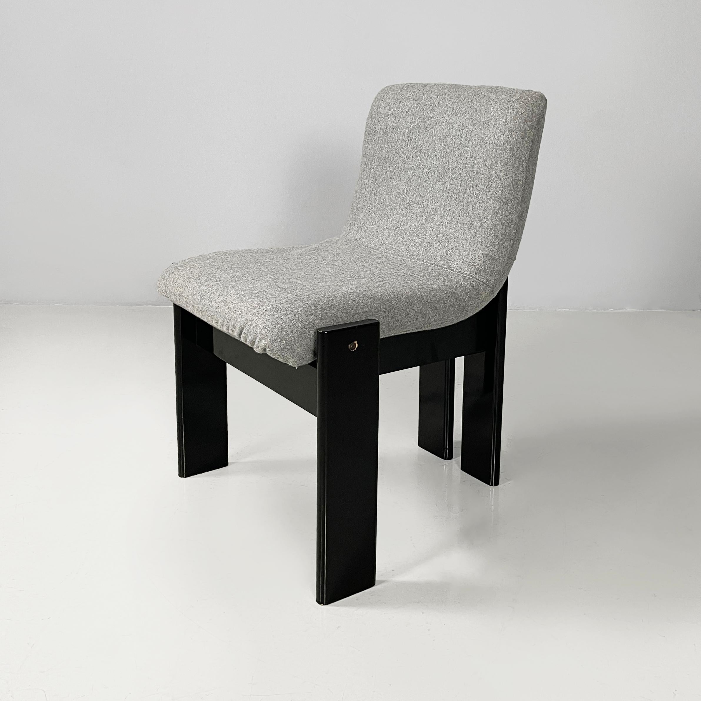 Italian modern Black lacquered wood and grey fabric chairs by Salocchi, 1970s
Set of 6 chairs with curved seat and backrest, padded and covered in grey fabric. The legs and the structure are made of black lacquered wooden slats.
Produced by Salocchi