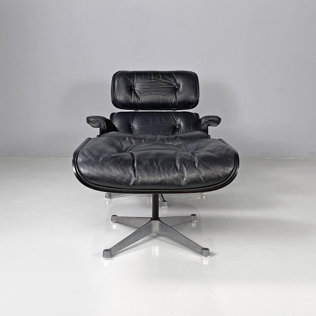 Italian modern black leather lounge chair 670 671 by Eames for ICF, 1970s
Armchair and pouf or chaise longue mod. 607 and 671 with black painted wooden body. The armchair is composed of a square seat and back with rounded corners, padded and covered