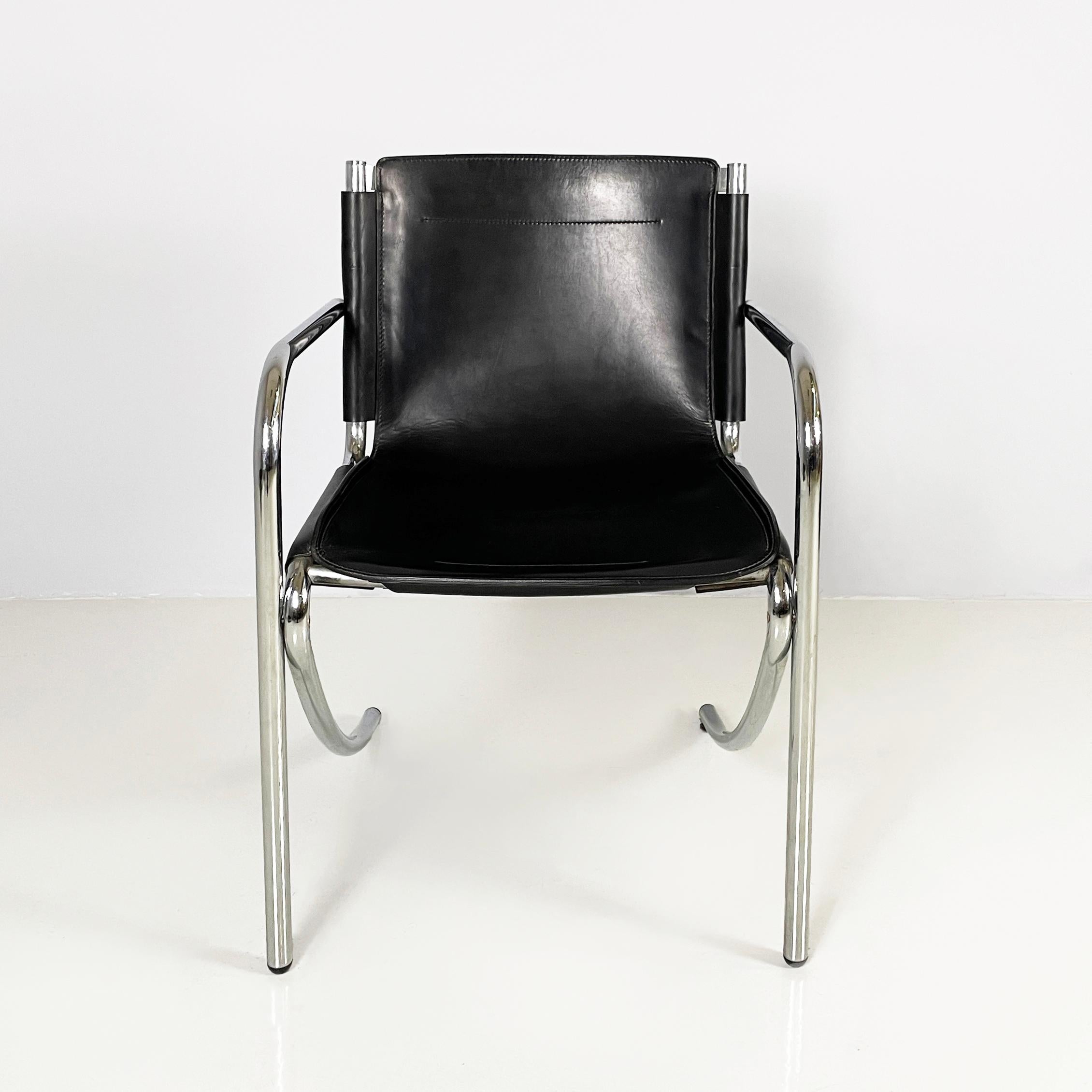 Italian modern Black leather and metal chair Jot by Giotto Stoppino for Acerbis, 1980s
Chair with armrests mod. Jot with seat and back in black leather. The leather is supported by a curved metal tubular structure. The front legs are straight while