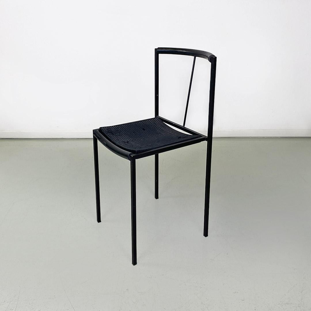 Italian modern black metal and rubber chair by Maurizio Peregalli for Zeus, 1984.
Chair with matt black metal structure, with four square-section legs, the rear of which extend up to the entire backrest, completed by a central metal rod and a