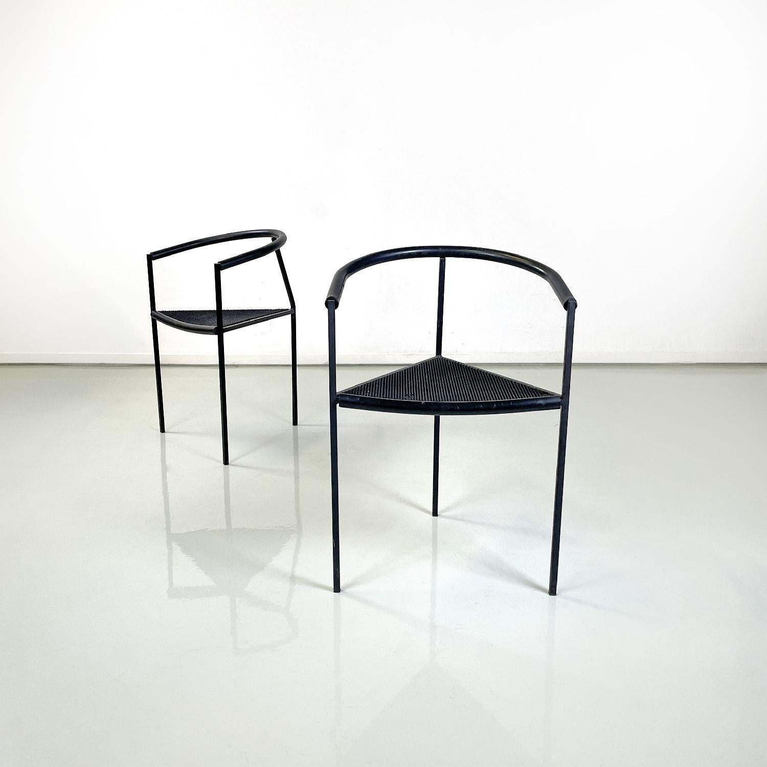 Italian modern black metal chairs by Peregalli and Calatroni for Zeus, 1990s
Pair of chairs with triangular seat in textured black rubber. The structure has a square section in matt black painted steel. The chair has a backrest and armrests covered