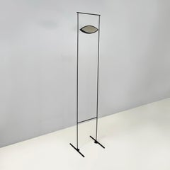 Horloge moderne italienne en métal noir avec miroir en forme d'œil par Alias, 1990