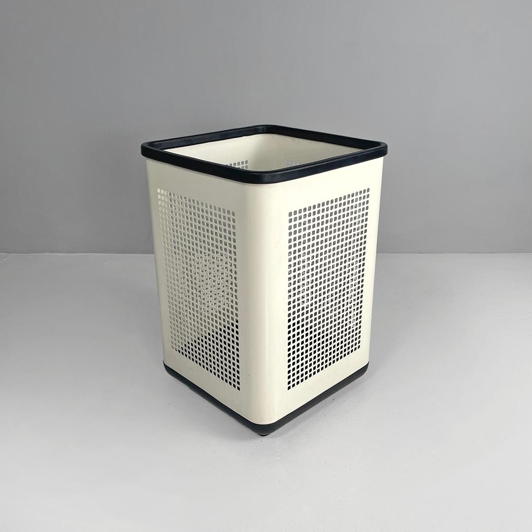 Italian modern black plastic and white metal umbrella holder by Neolt, 1980s
Umbrella stand or office wastebasket with a square base. The main structure is made of a perforated metal sheet with square holes, painted in white. The top and base with