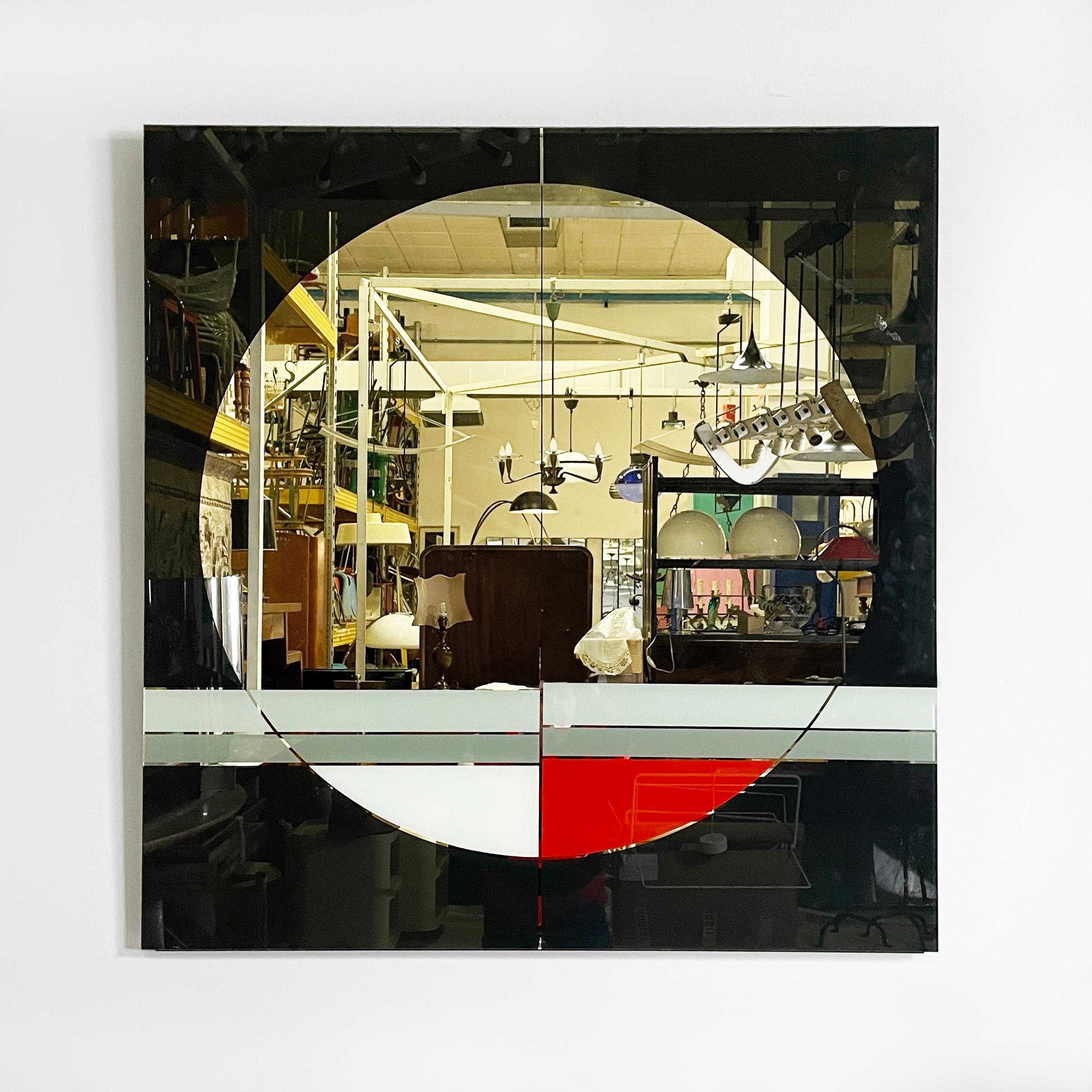 Italian modern black red gray wall mirror Morphos by Carmi for Acerbis, 1980s
Wall mirror from Morphos series, rectangular in shape. On the profile there are geometric decorations in black, red and gray.
Produced by Acerbis International in 1980s