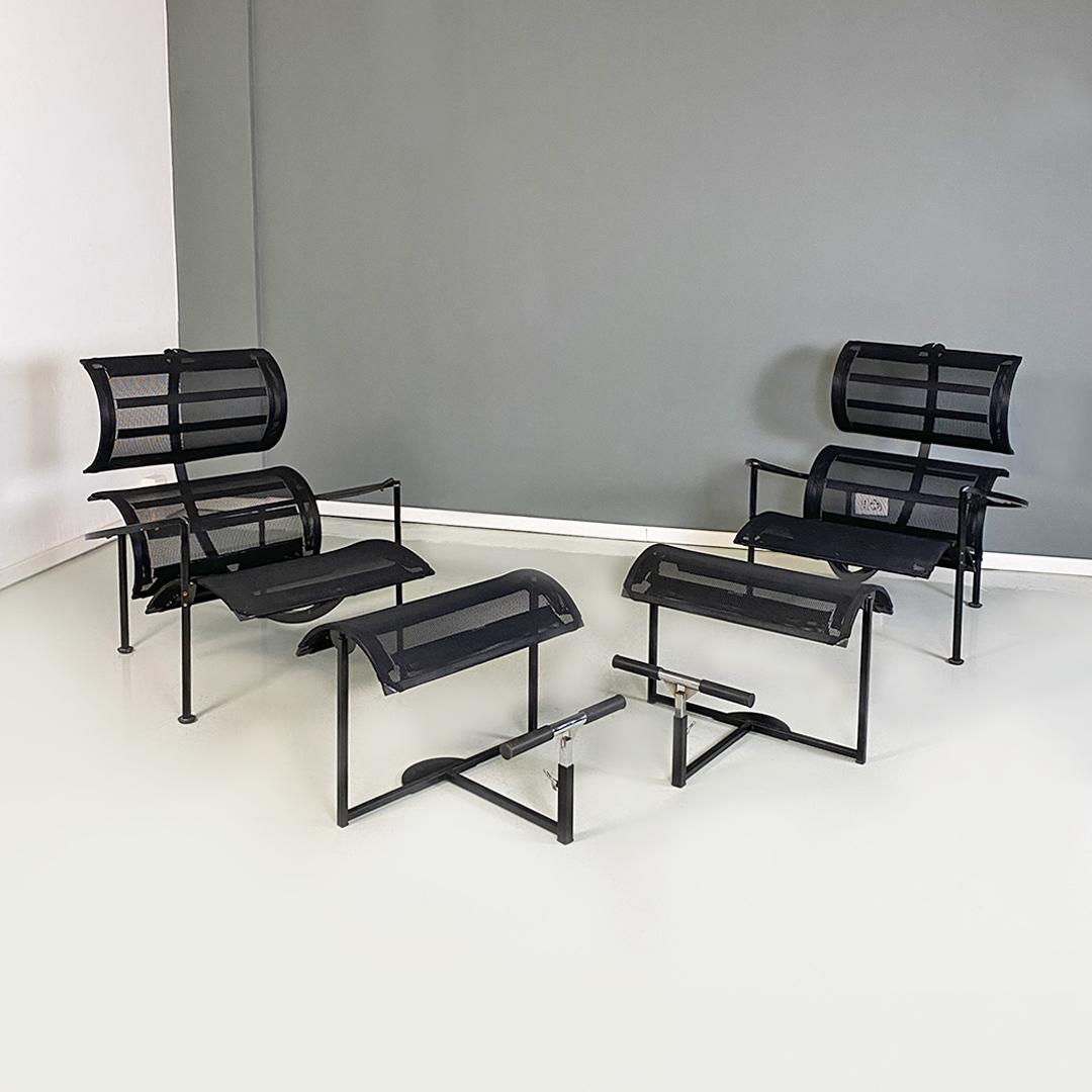 Italian modern pair of black metal and plastic Signorina Chan armchairs by Carlo Forcolini for Alias, 1986.
Armchairs with footrest model Signorina Chan, with black painted curved metal structure and seat made up of a polyester mesh. Footrest with