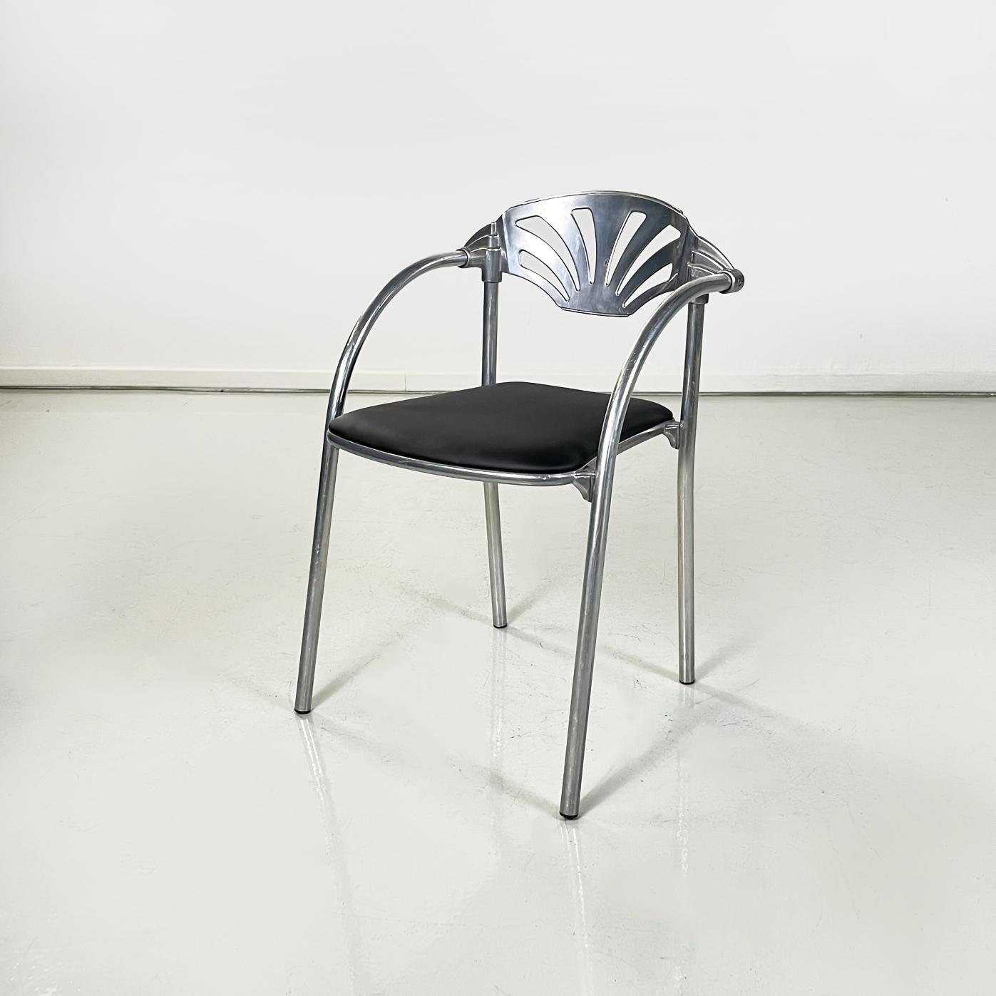 Italian modern black sky Chairs Alisea by Lisa Bross for Studio Simonetti, 1980s
Fantastic set of 4 chairs mod. Alisea with padded seat, covered in black sky. The rounded and curved backrest is in aluminum. The structure of the armrests and legs is