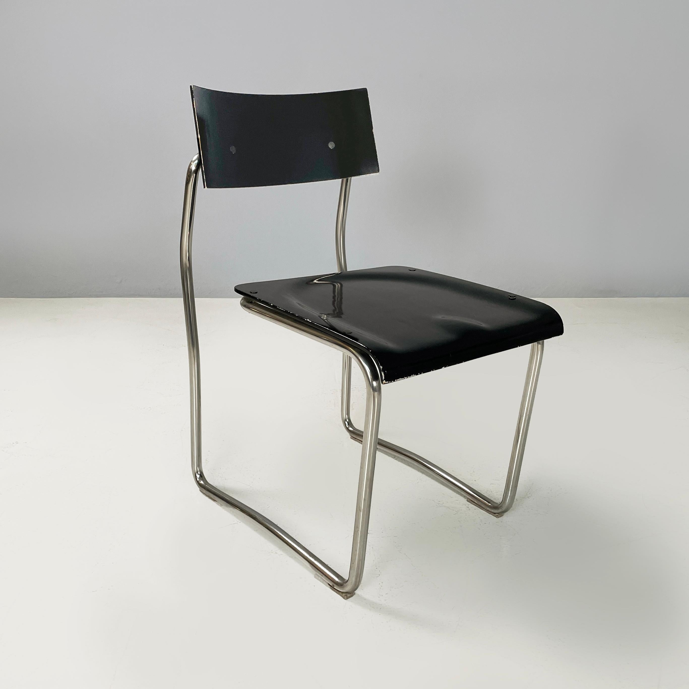 Italienische Moderne Schwarzer Stuhl und Metall Stühle Lariana von Giuseppe Terragni für Zanotta, 1980er
4 Stühle Mod. Lariana mit gebogener rechteckiger Rückenlehne und geformtem Sitz aus schwarz lackiertem Holz. Die Struktur besteht aus einem