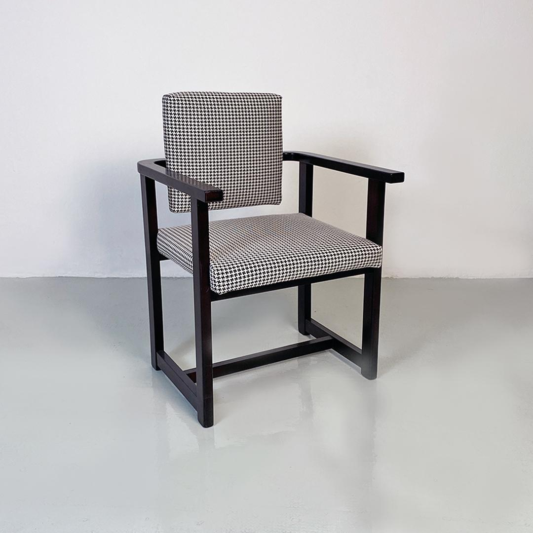 Italian modern black lacquered wood base and pied de poule cotton seat small armchair, 1970s.
Armchair with black painted wooden structure and seat and back upholstered and covered with new black and white pied de poule cotton.
1970s
Entirely