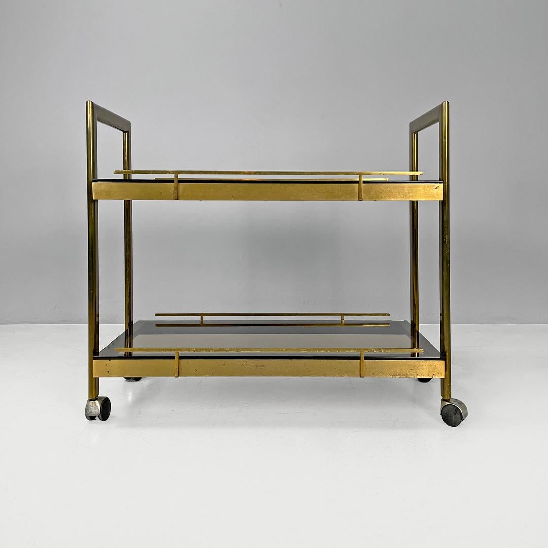 Modern Italian modern brass and smoked glass trolley with handles, 1980s For Sale