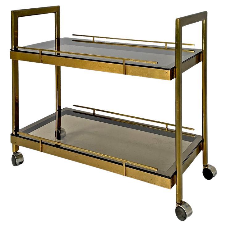 Italian modern brass and smoked glass trolley with handles, 1980s For Sale