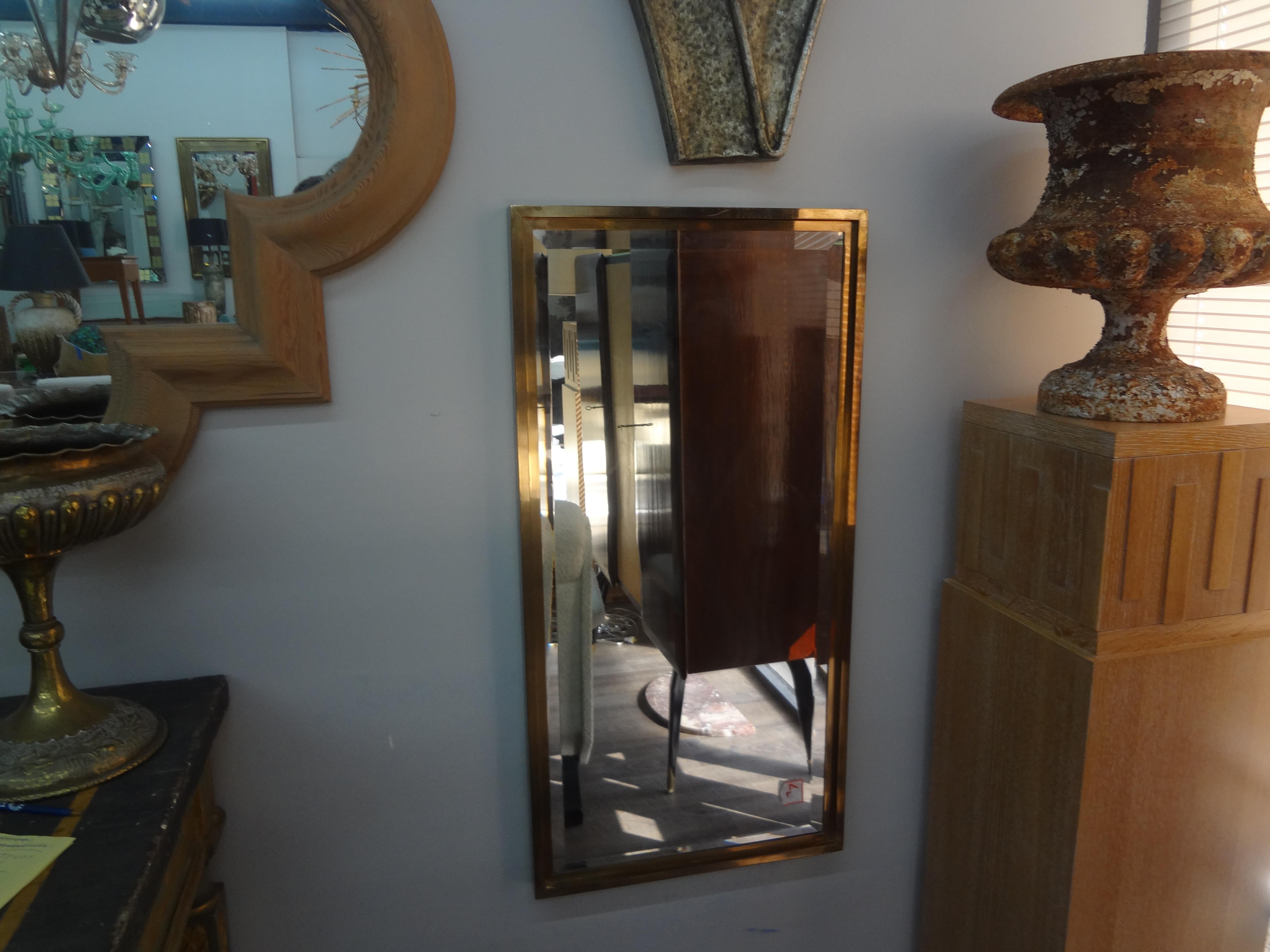 Italian Modern Brass Beveled Mirror.
Handsome Italian brass beveled mirror
This lovely Italian modern Gio Ponti inspired brass mirror dates to the 1960's and has a great patina.
Can be displayed either vertically or horizontally.
Perfect for a