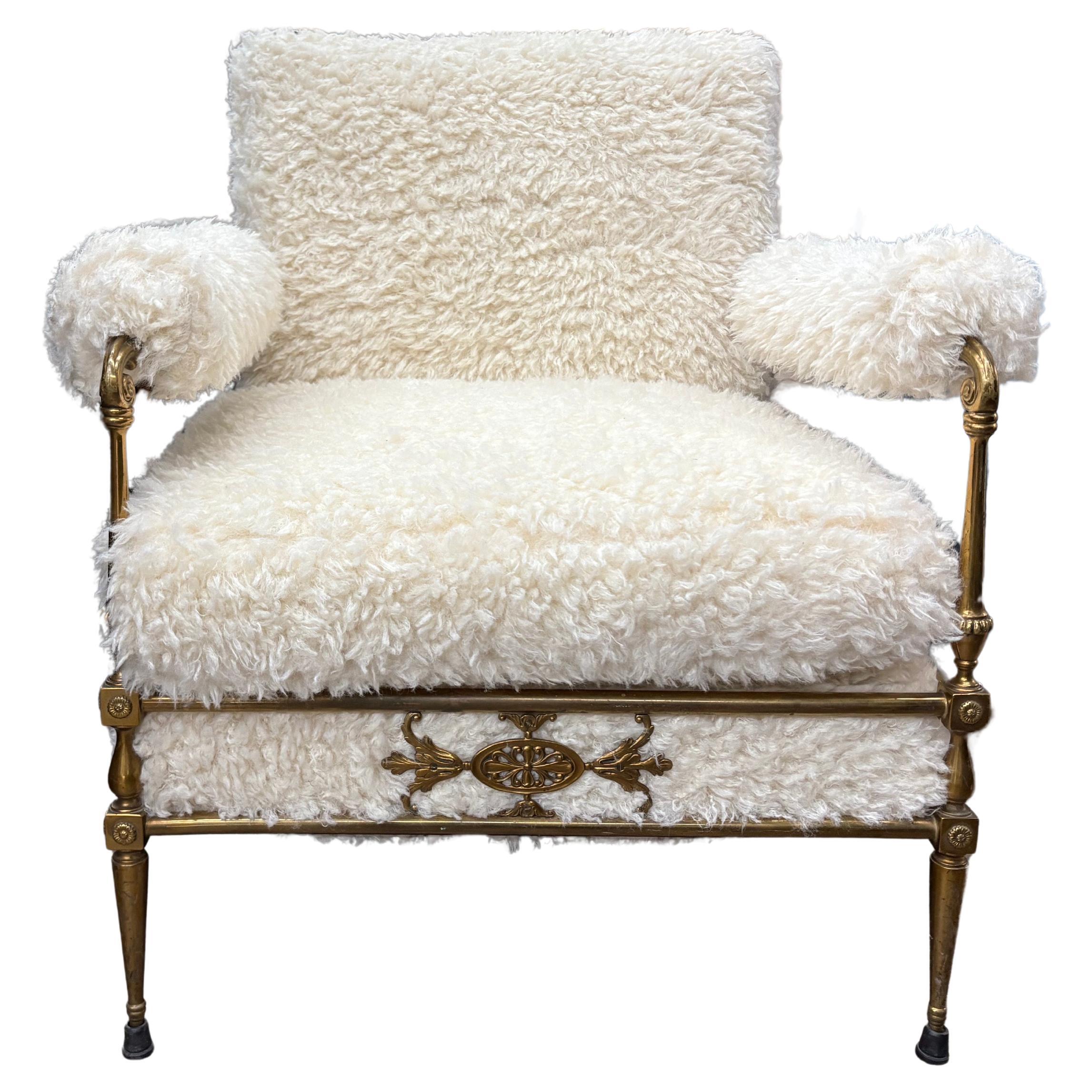 Italian Modern Brass Chiavari Chair.
Offered is a splendid Italian mid century modern brass chair, armchair or side chair by Chiavari which dates to the 1960's. This large scale brass chair was recently upholstered in faux fur and is most