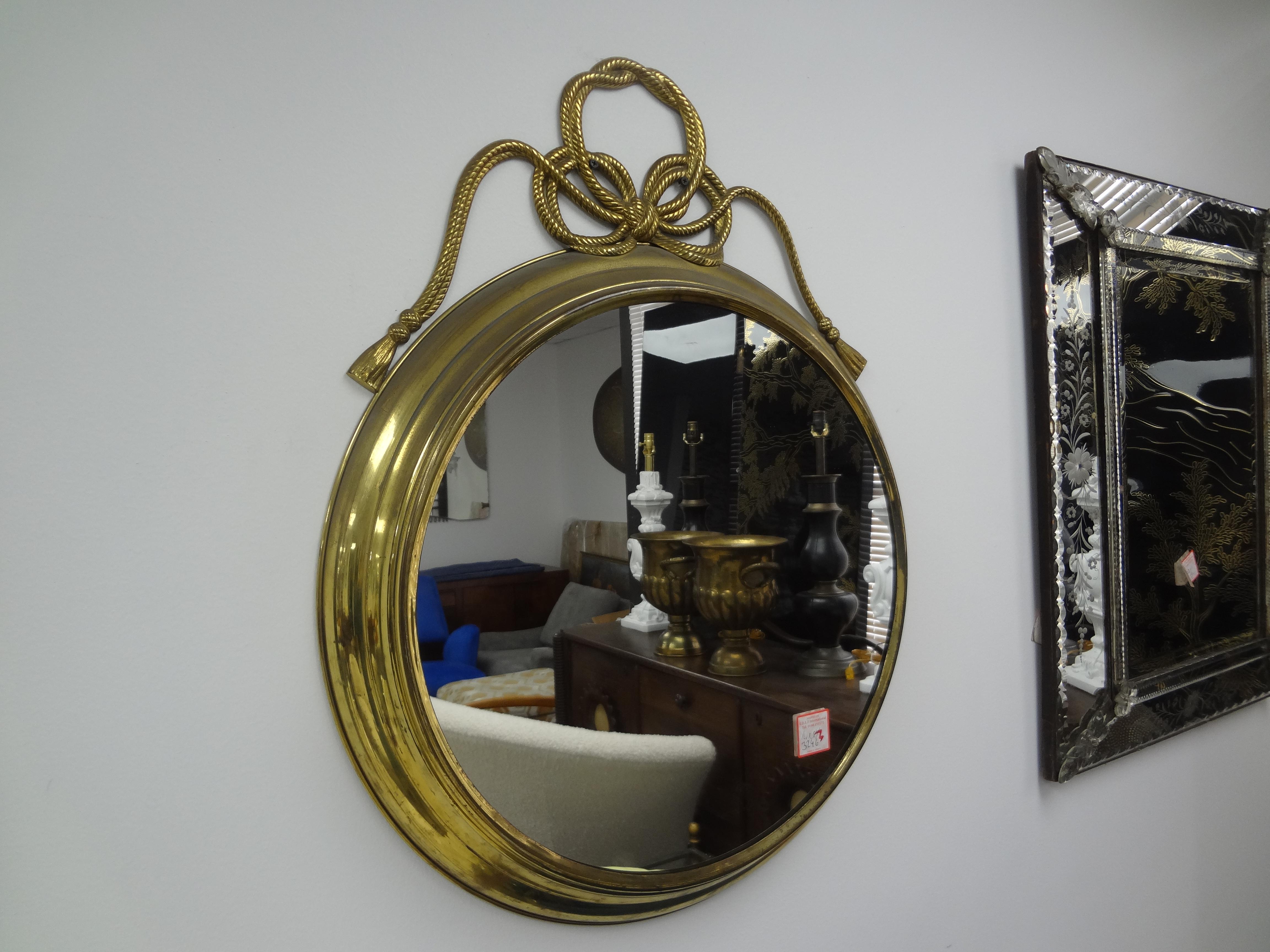 Mid-20th Century Italian Modern Brass Mirror With Bow For Sale
