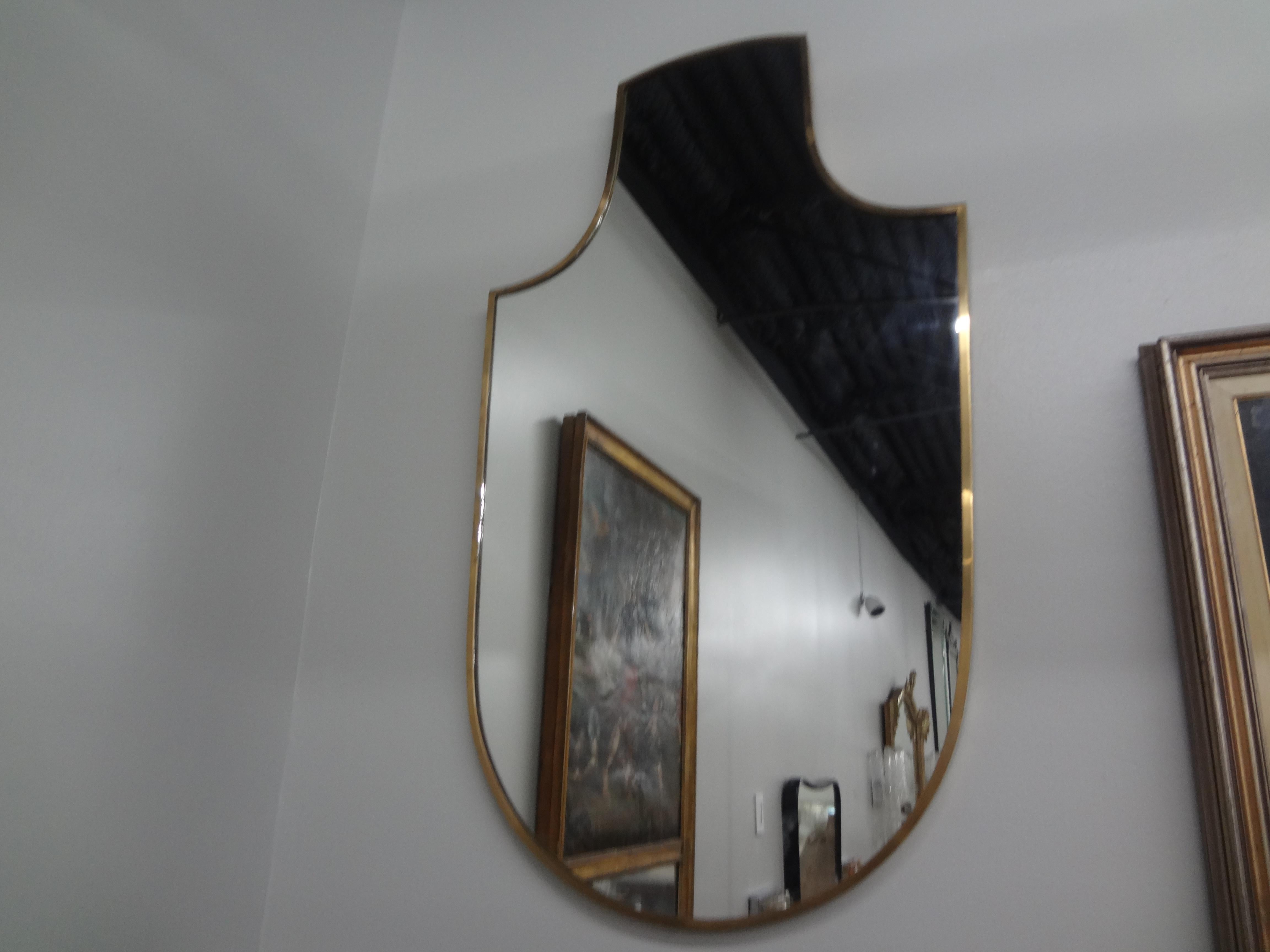 Mid-Century Modern Italian Modern Brass Shield Shaped Mirror For Sale