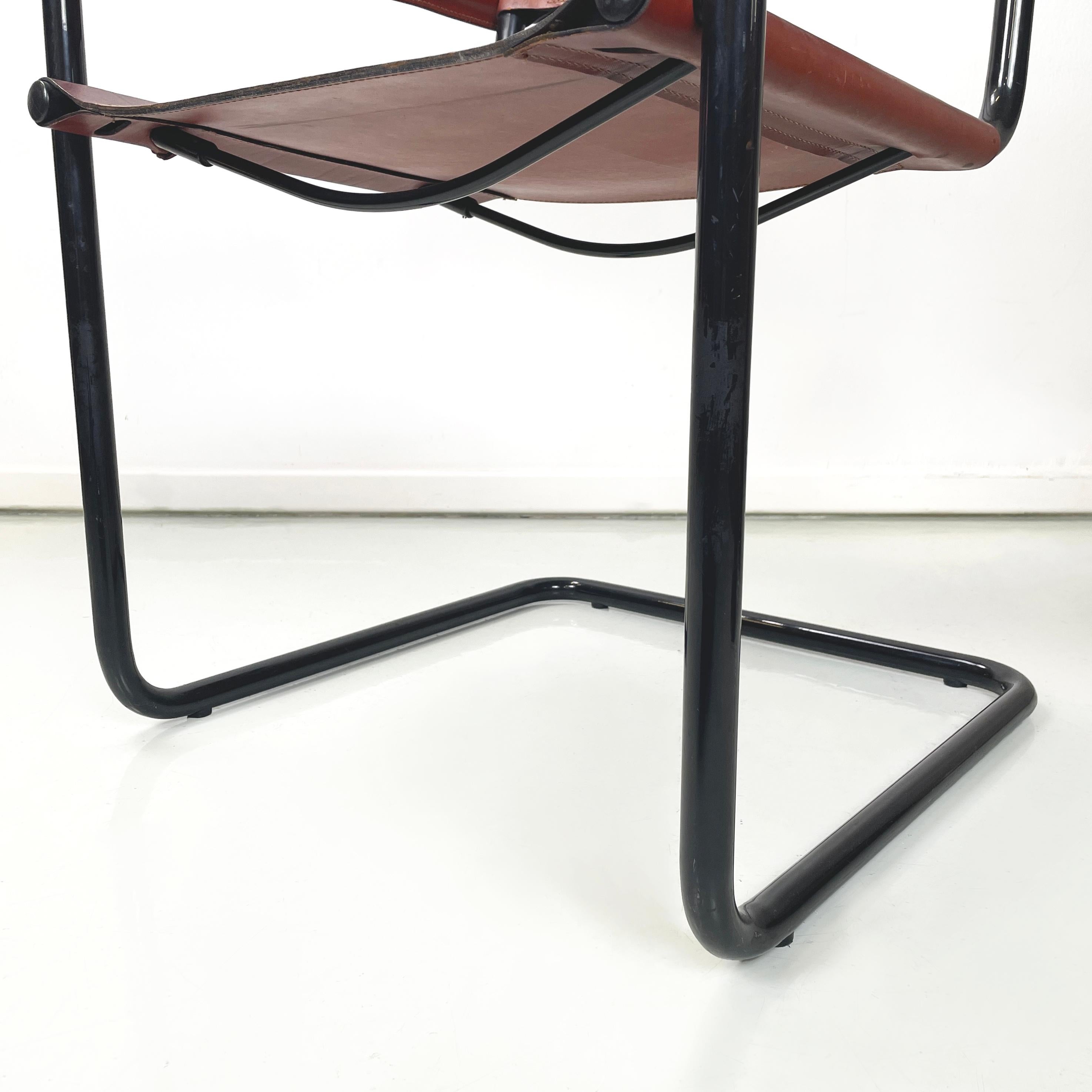 Italian modern Brown dining chair MG5 by Marcel Breuer and Mart Stam for Matteo Grassi, 1970s
Chair mod. MG5 with backrest and seat made of a brown leather band. The structure is in black painted metal tubing. The armrests are also covered in brown