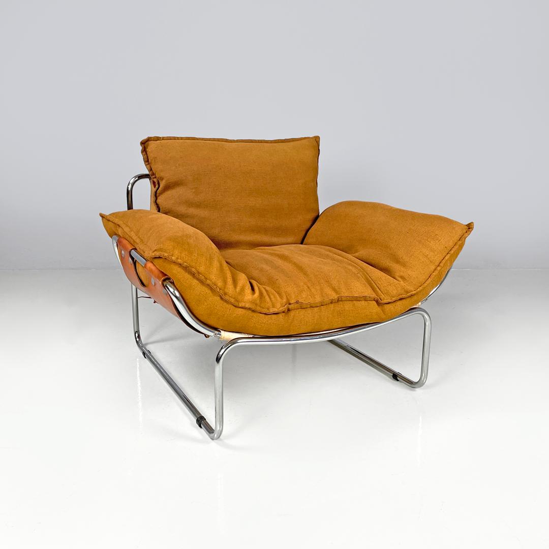 Sillón moderno italiano de tela marrón Compor S 72 de Gero para Mussi, años 70
Sillón mod. Compor S 72 en tela y piel marrón. La estructura es de tubo de metal cromado, en los laterales del asiento la estructura se ensancha y se curva hacia arriba