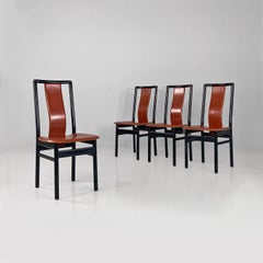 Italian modern brown leather and black wood chairs, 1970s