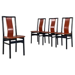 Italian modern brown leather and black wood chairs, 1970s