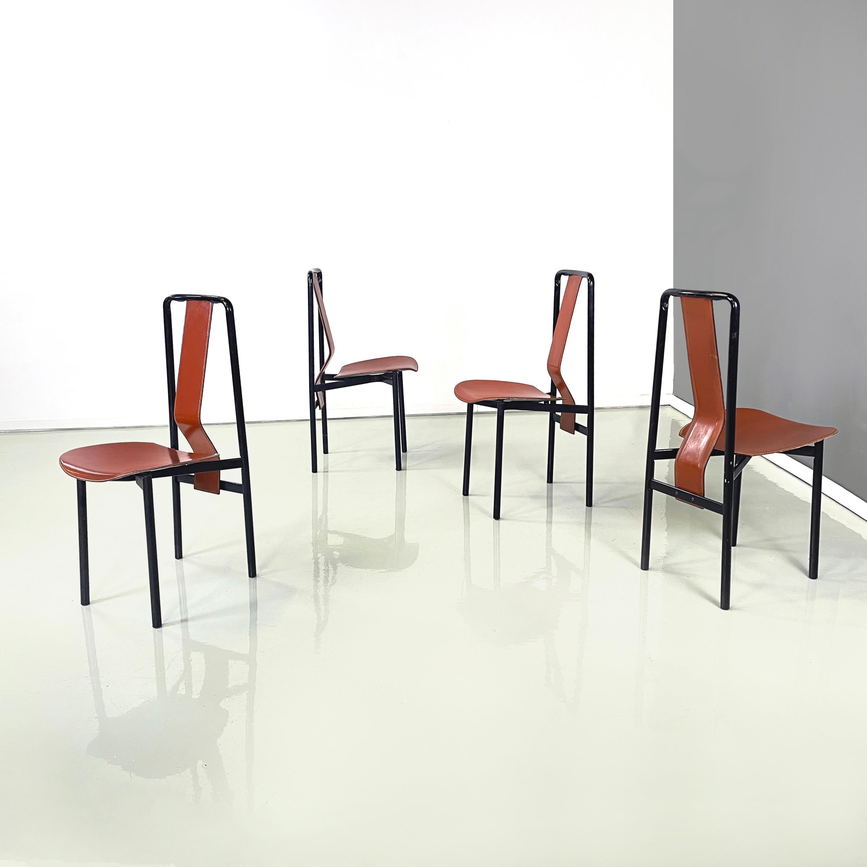 Italian modern Brown leather and black metal Chairs Irma by Achille Castiglioni for Zanotta, 1970s
Set of 4 chairs mod. Irma in red-brown leather and black painted steel. The shaped and leather-covered backrest has a black metal tubular structure,